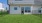 a house with a lawn in front of it