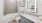 a bathroom with a tub, sink and toilet